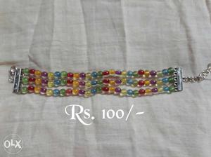 Red, Green, And Purple Beaded Bracelet