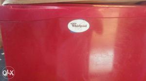 Red Whirlpool Appliance fridge 165ltrs