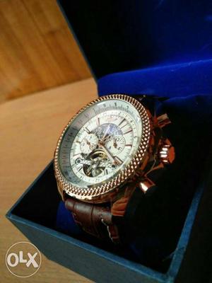 Round White Mechanical Watch With Brown Leather Strap
