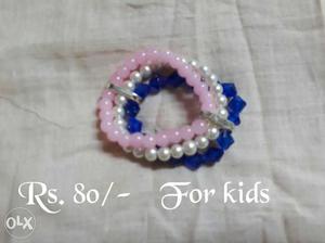 Three Blue, Pink, And White Beaded Bracelets