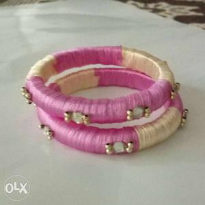 Two Embellished Pink-and-beige Silk Thread Bangles