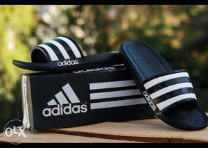 White-and-black Adidas Slide Sandals On Box