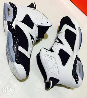 White-gray-and-black Air Jordan Basketball Shoes