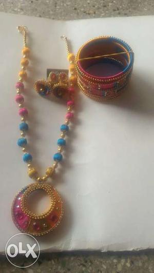 Yellow, Blue, And Pink Beaded Necklae