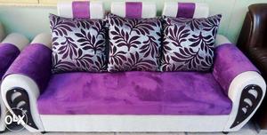 Attractive Fabric sofa with cushion.