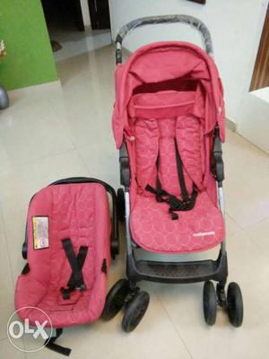 Baby's Pink-and-black Travel System