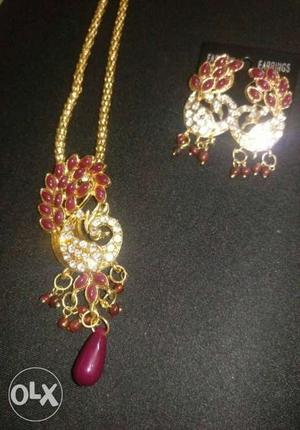 Gold And Red Necklace With Pair Of Earrings\
