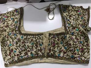 Heavy blouse with antique work all over.