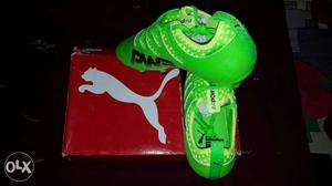 Pair Of Green Puma boots