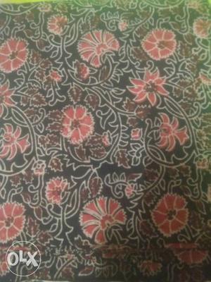 Red And Black Floral Textile
