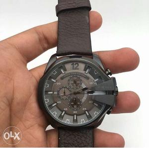 Round Gray Chronograph Watch With Black Leather Strap