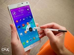 Samsung galaxy note4 white mint condition 1 yr fix rate