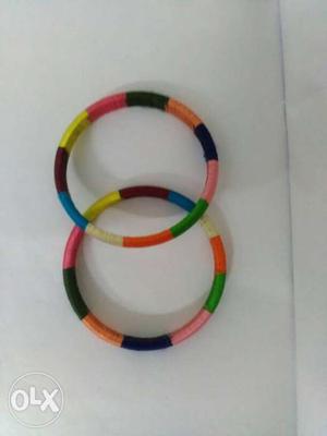 Two Orange-black-and-pink Silk Thread Bangles