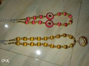 Two Pink And Yellow Silk Thread Necklaces