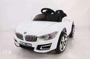 White Bwm Battery Powered Ride On Toy Car