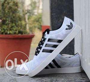 White-and-black Adidas neo
