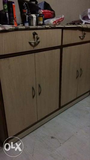 Wooden Cabinet with wheels in good condition
