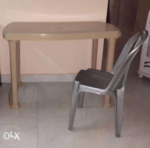 6 month old Gently use 1 Plastic table and 2 chairs