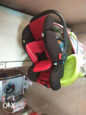 Baby's Black And Red Car Seat Carrier