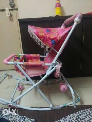 Baby's Pink And White Metal Rocker