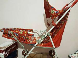 Baby's Red And White Umbremma Stroller