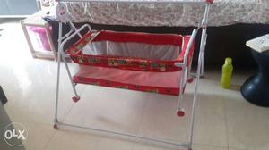 Baby's Red Cradle