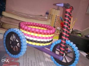 Black, Blue, And Pink Paper Trike