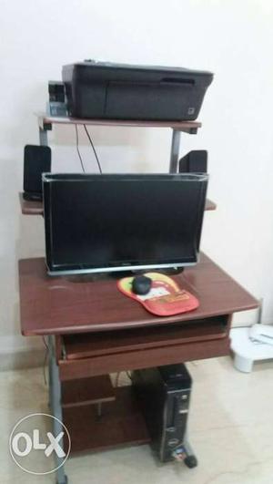 Brown Wooden Computer Desk With Flat Screen Monitor
