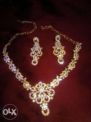 Gold Diamond Embellish Necklace And Pair Of Earrings