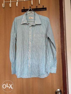 Hardly uesed light blue and white strips shirt