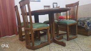 Oblong Brown Wooden Green Padded 5-piece Dining Set