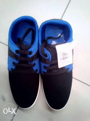 Pair Of Black-and-blue Sneakers