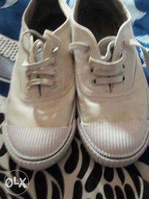 Pair Of White Sneakers