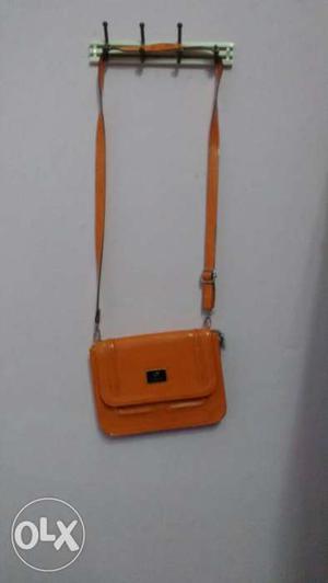 Peach 2 zippers sling bag brand zilleria. courier