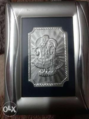 Radha krishna photo frame of artificial silver. New and