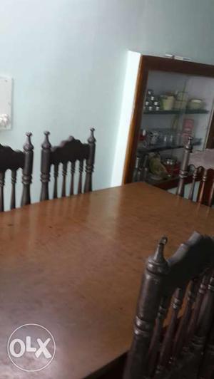 Sagon wood good condition dining table with 6 chairs