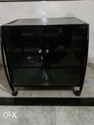 TV cabinet in a good condition. Dark chocolate