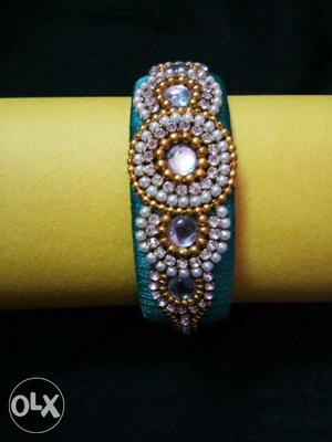 Teal, Purple, And Gold-colored Silk Thread Bangles