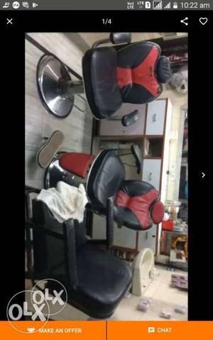 Three Black-and-red Leather Barber Chairs Screenshot