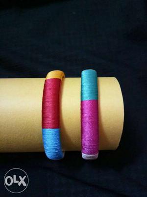 Two Blue, Red, And Purple Silk Thread Bangle Bracelets