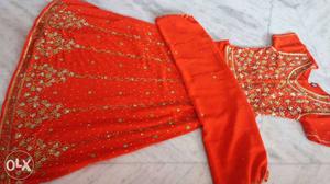 Women's Red And gold colour party wear