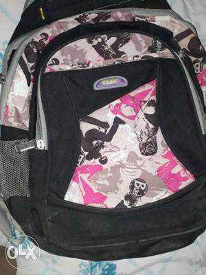 White, Pink And Black Backpack