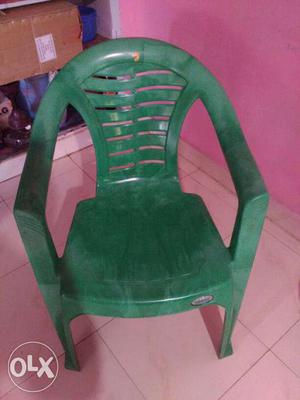 4 green plastic chairs all in good condition