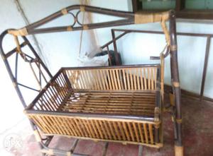 Baby's Brown And Yellow Wooden Crib Cradle