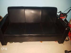 Black Leather Padded Sofa
