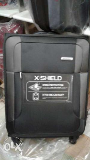 Black X-Shield Hard-case Luggage
