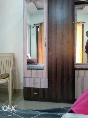 Brown And Wooden Cabinet and Bed in good condition