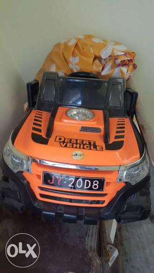 Children's Orange And Black Desert Vehicle Ride-on Toy