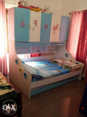 Kids bedroom set. bed with cupboard and