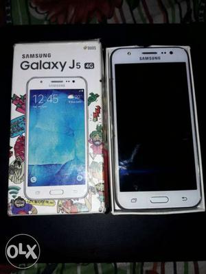 Samsung galexy j5 with box charger in very neet